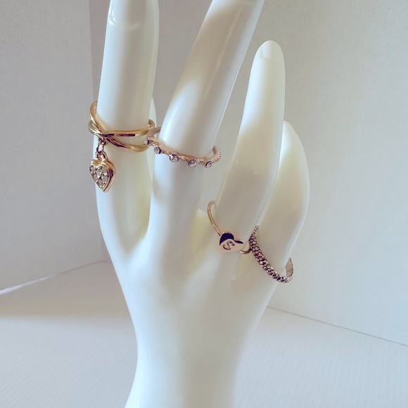 unbranded Jewelry - Gold tone boho ring set all different sizes layering rings 4 total